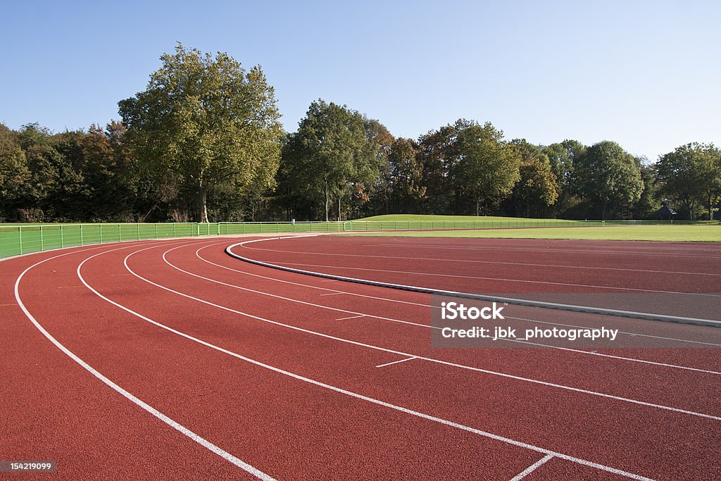 Running track lines on a sunny day